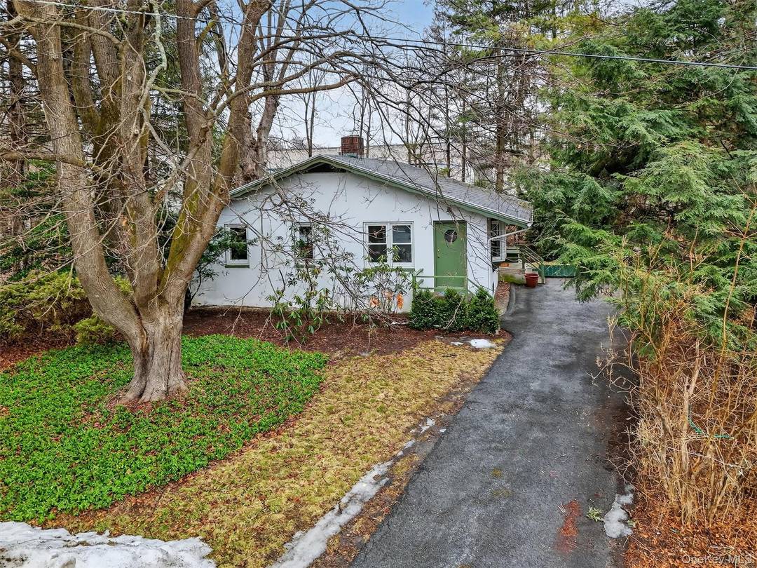 Fall in Love with this Charming Mediterranean Style Garden Home.