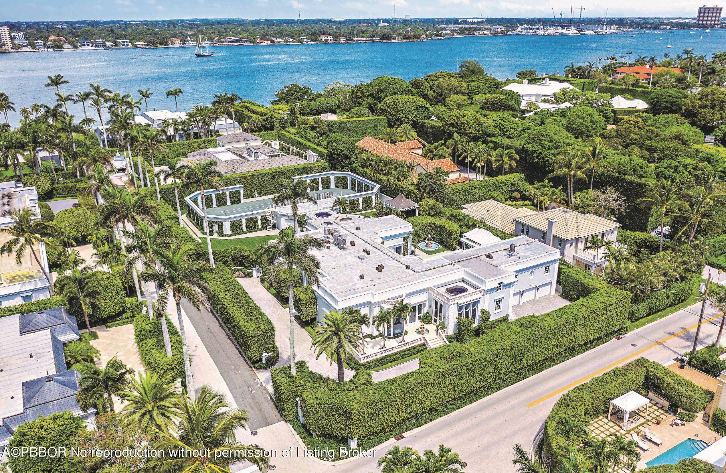 Pristine and secluded estate home sits regally on a nearly 38, 000 SF highly elevated lot.