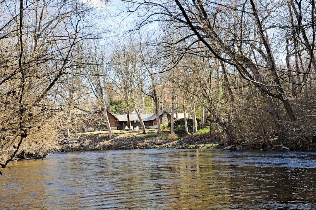 MOST UNIQUE HOUSE IN WESTPORT LARGE LOG HOME ON THE RIVER THAT IS STOCKED WITH TROUT.