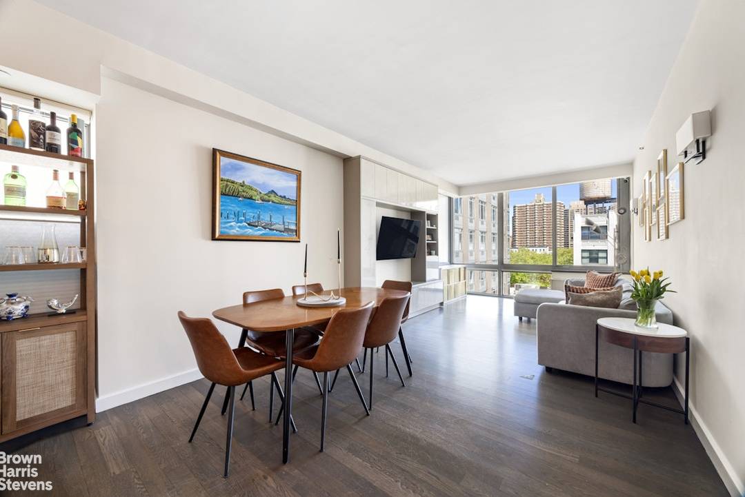 Experience refined West Side living in this bright and beautifully maintained corner two bedroom, two bath residence at the Hudson Condominiums.