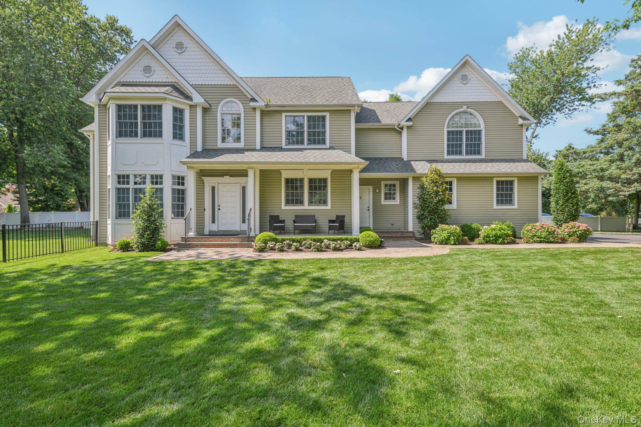 Welcome to this stunning 4 bedroom Colonial that perfectly blends elegance, comfort, and functionality.