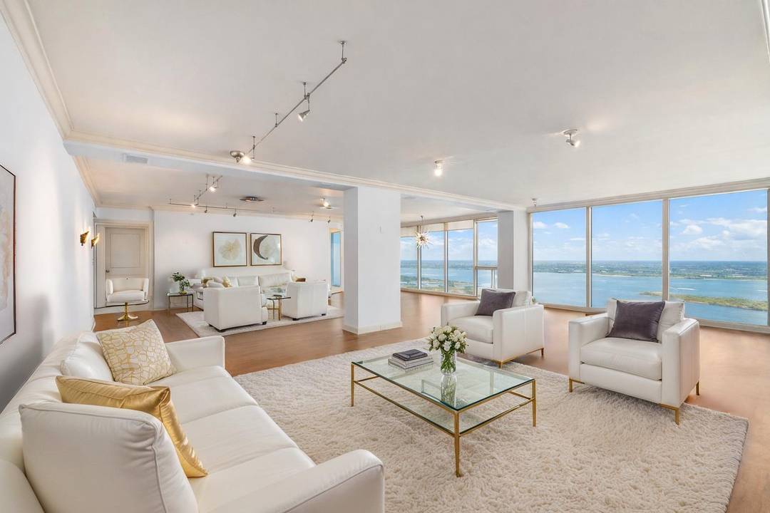 Breathtakingly expansive intracoastal and ocean views from this sprawling and elegantly restored three bedroom, four and half bath condo with library and lounging space in The Plaza of the Palm ...