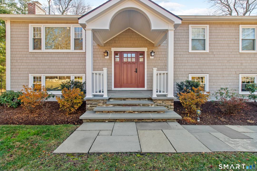 Must see, one of a kind, beautifully renovated raised ranch with truly unique open layout concept located within walking distance to the Town center.