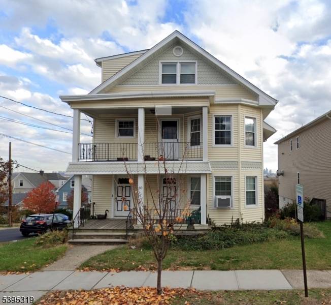 Welcome to this wonderfully spacious 3 family home in East Rutherford offering a stunning view of New York City !