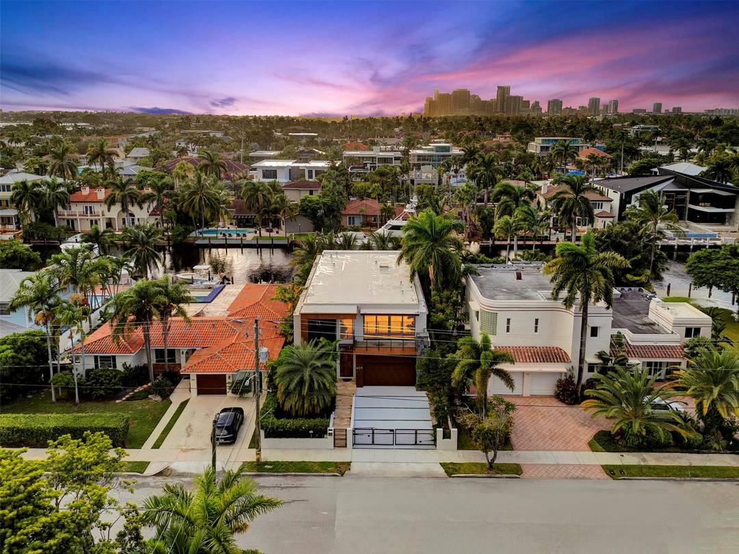 Not your average home on the Las Olas Isles, behind the gates this custom 4 bed, 4.