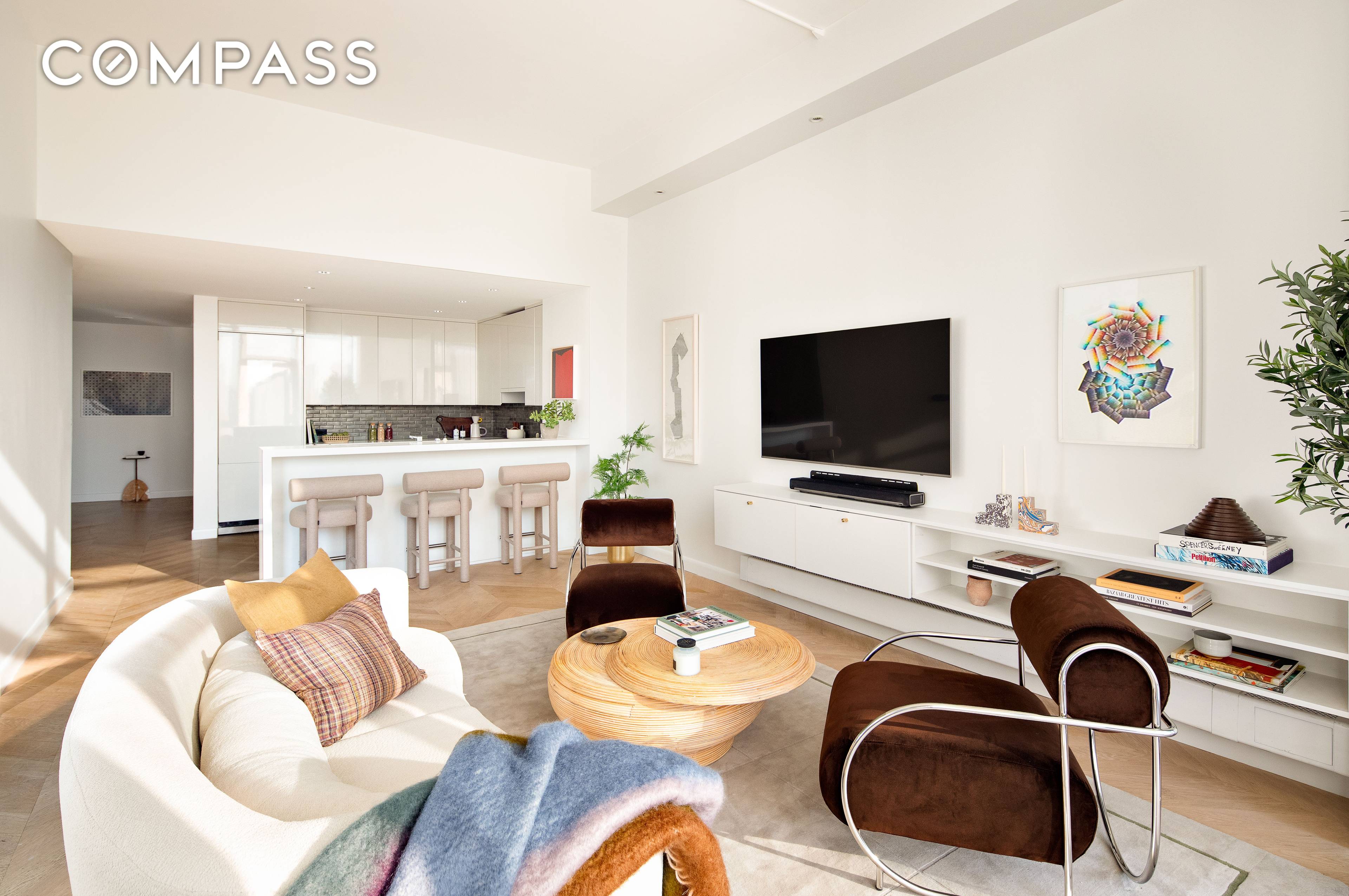 Penthouse B at 255 Hudson Street ; Experience modern living and designer luxury in this pristine turnkey two bedroom, two and a half bath residence, featuring a gracious open layout, ...