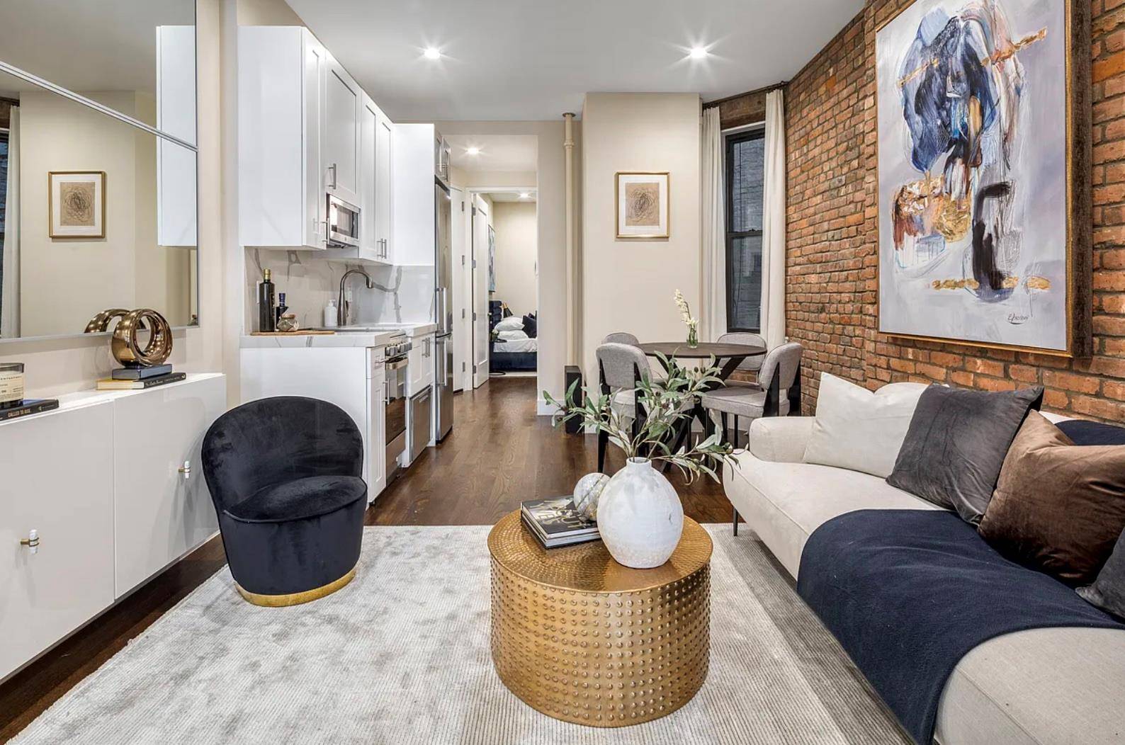 AVAILABLE AUGUST 1ST OPEN HOUSE BY APPOINTMENT This gorgeous 3BR apartment, which has undergone a stunning gut renovation, boasts an abundance of charm, such as exposed brick and hardwood floors.
