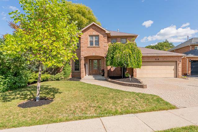 Welcome to this beautiful 4 bedroom executive home, set on a stunning 1 3 acre lot with picturesque pond views.