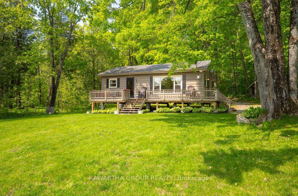 This is it ! Sit on your deck overlooking Balsam Lake, watch the kids play in the water or on the level lawn.