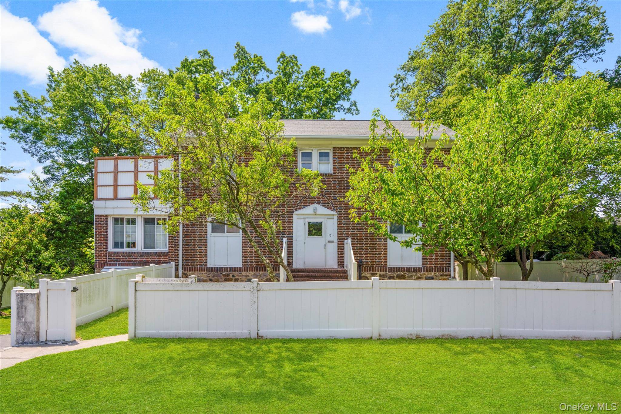 This charming brick colonial nestled in the desirable Sunhaven neighborhood of New Rochelle awaits your creative touch !