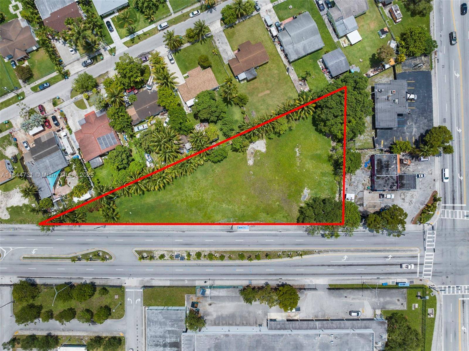 Site plan approved 0. 86 acre corner lot in unincorporated Miami Dade County, zoned B 1.
