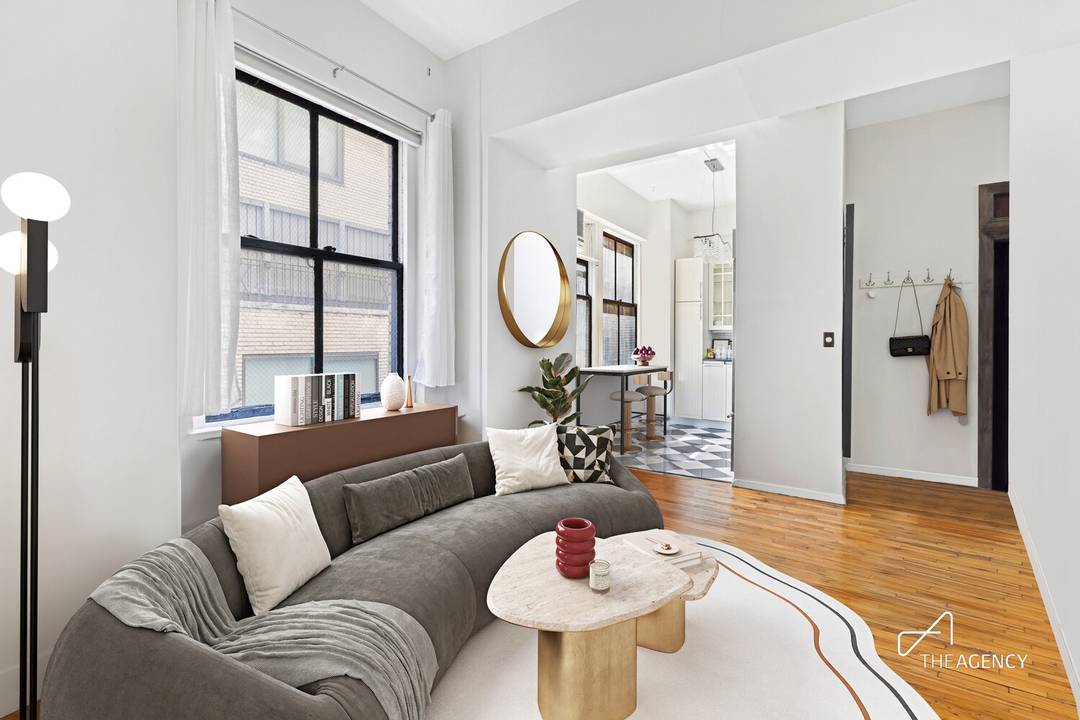 Welcome to Residence 5J at The Sage House a truly special home offering low monthly maintenance, prime location, and timeless architectural character.