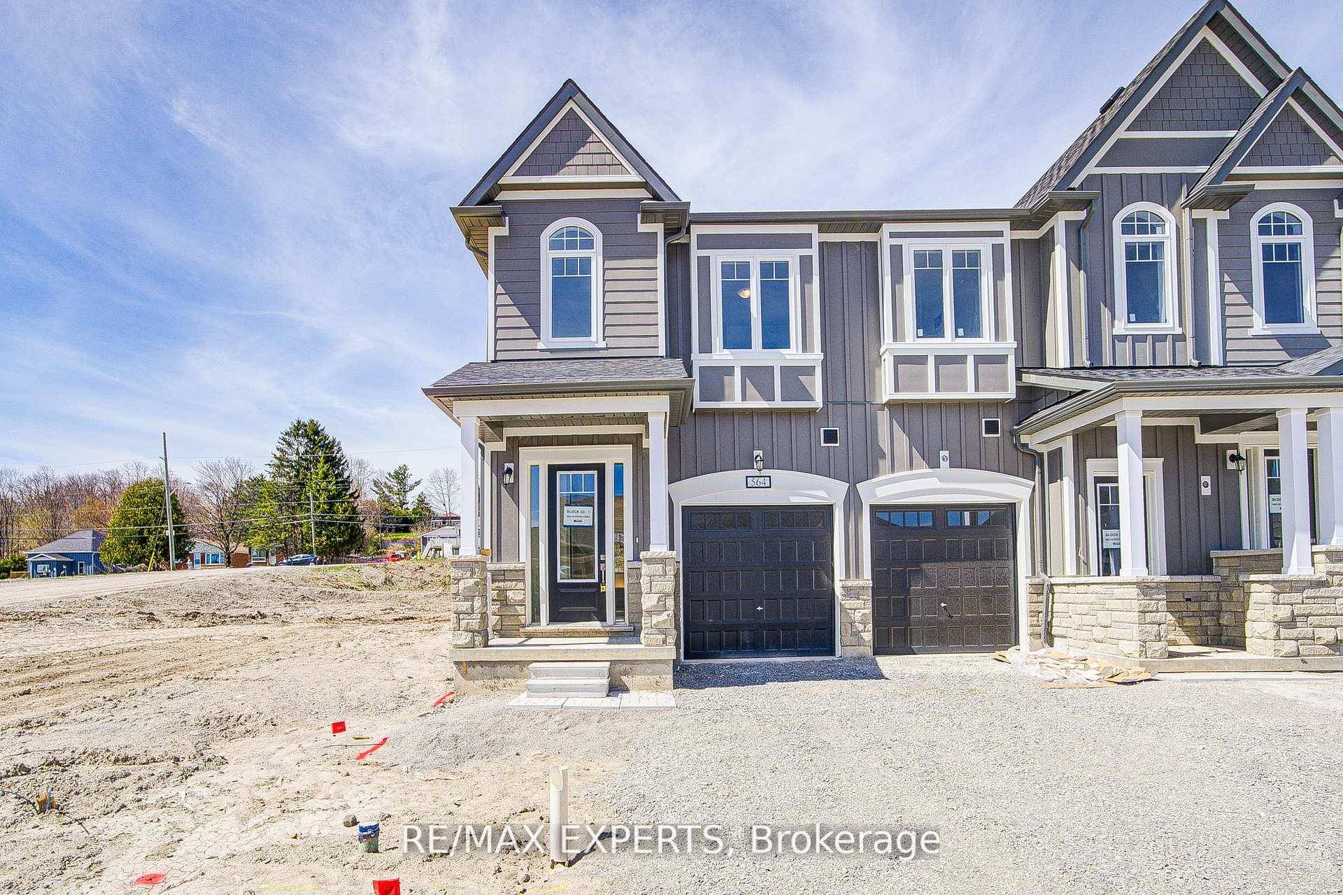 Experience Luxury lakeside living in this brand new, never lived in, furnished end unit townhouse located in the highly coveted Bayport Village community of Midland.