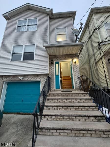 Beautiful 2003 built 2 family home offering modern space, comfort, and versatility !