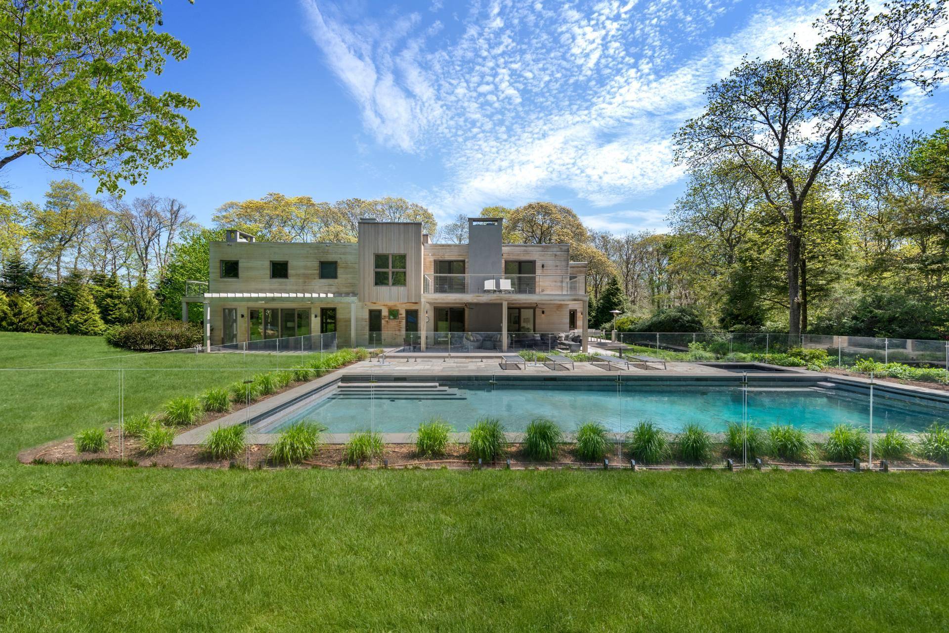 Discover the epitome of luxury living in East Hampton South.