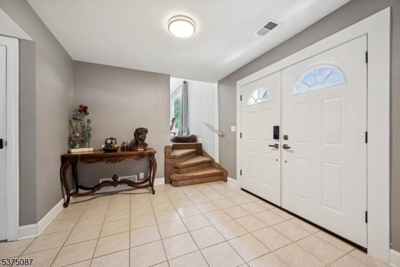 A spacious 5 bedroom, 3 bath Colonial split offering 2, 300 sqft of updated living space.