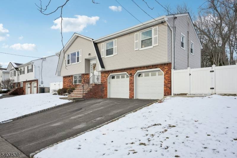 Welcome home to this beautifully maintained 4 bedroom, 2 bath Bi level, nestled on a quiet residential street in the heart of Totowa.
