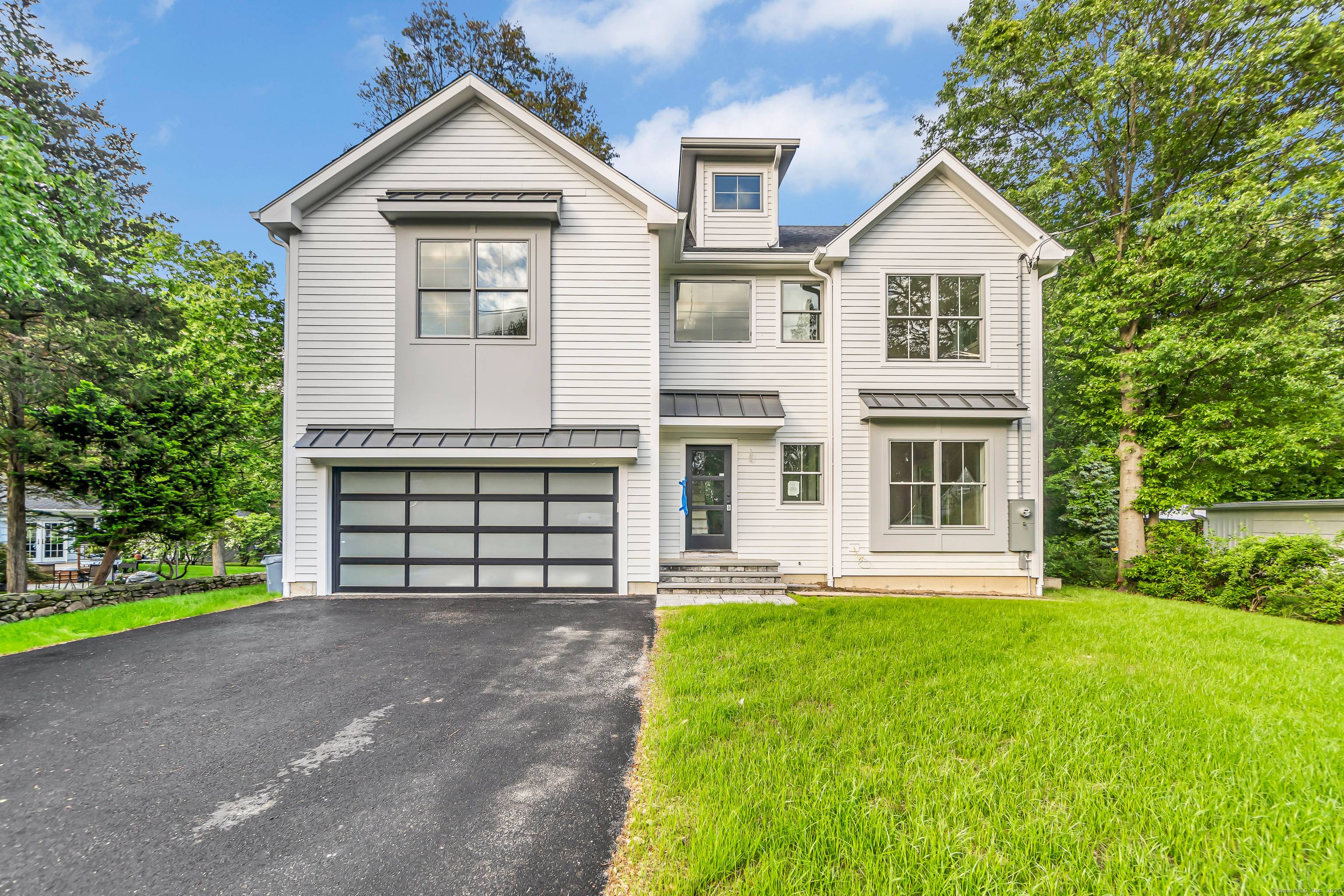 Stunning modern new construction boasting high quality craftsmanship and a spectacular high end finish.