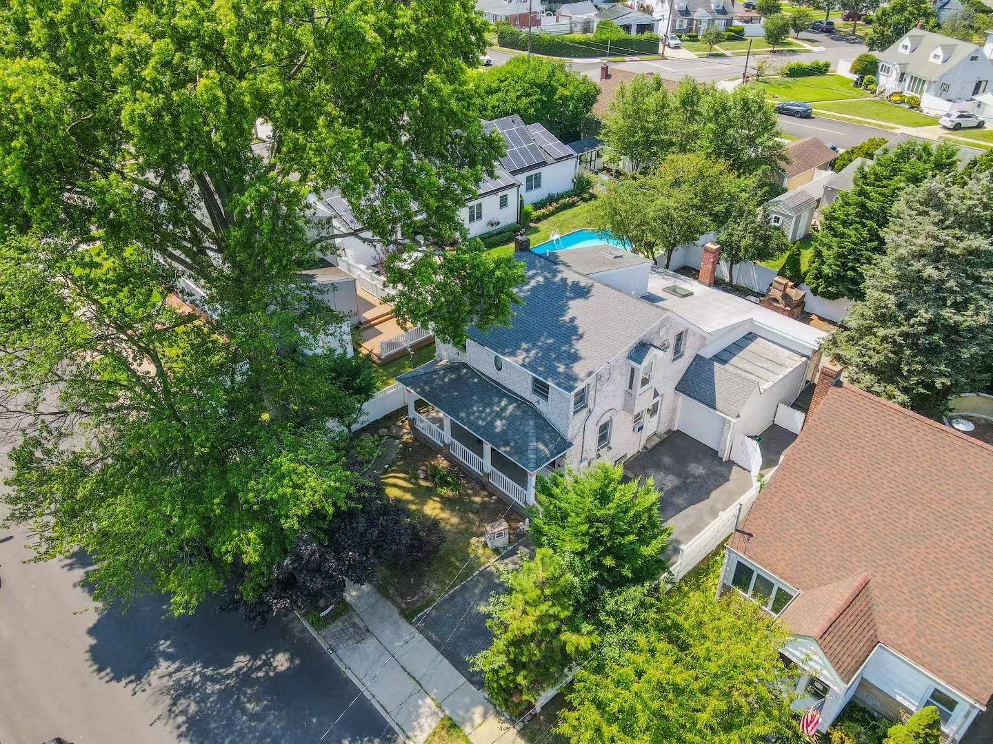 oversized single family located in the prime location of East Meadow.