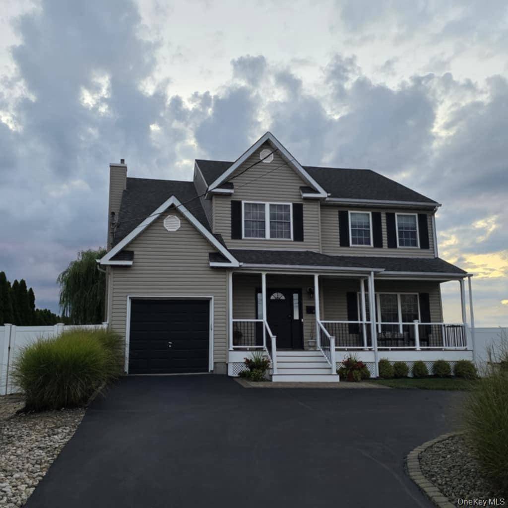 Stunning 4 Bedroom Waterfront Colonial with Modern Upgrades amp ; Prime Canal Location with Low, Low FLOOD INSURANCE REQUIRED !