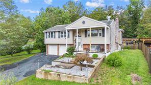Nestled in the heart of charming Wolcott, this beautiful property at 481 Center St is a real gem !