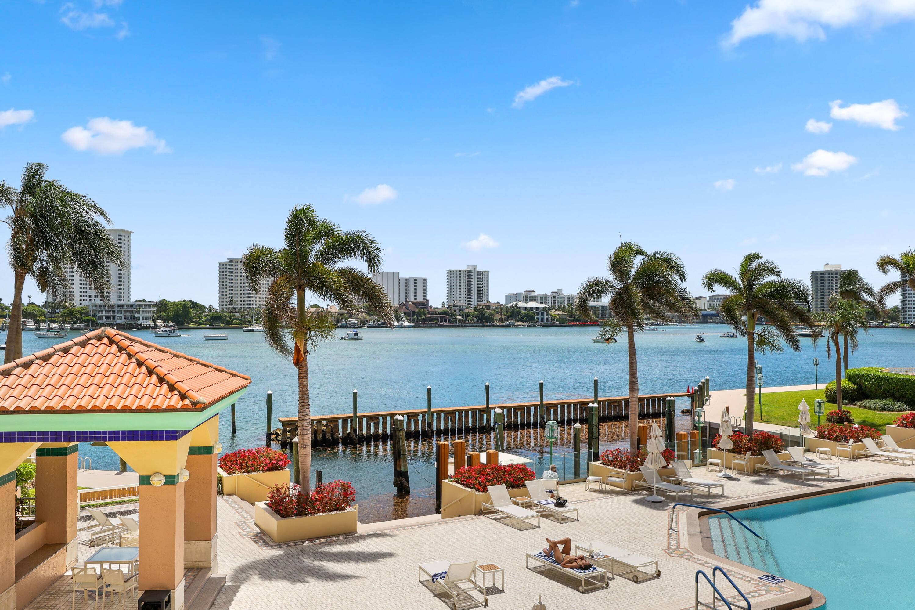 Welcome to your magnificent home in Mizner Tower, where elegance meets comfort overlooking Lake Boca.