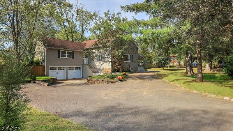 Rarely does a property combine comfort, character, and future potential as seamlessly as this 3 bedroom, 2 full bath custom ranch located in one of the area's most desirable settings.