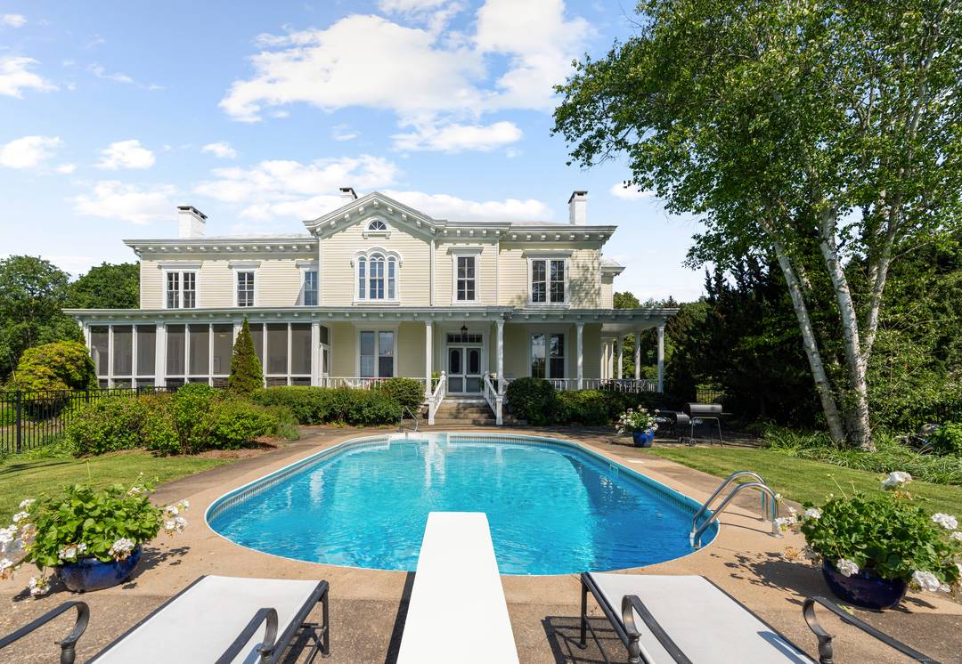 Cove Lawn is a Historic Italianate Estate with Water Views and Guest House.