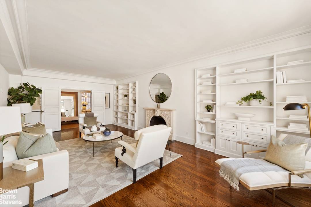 Upon entering this spacious seven room apt, one is struck by bright, southern views over the Armory to Billionaire's Row from the living room windows.