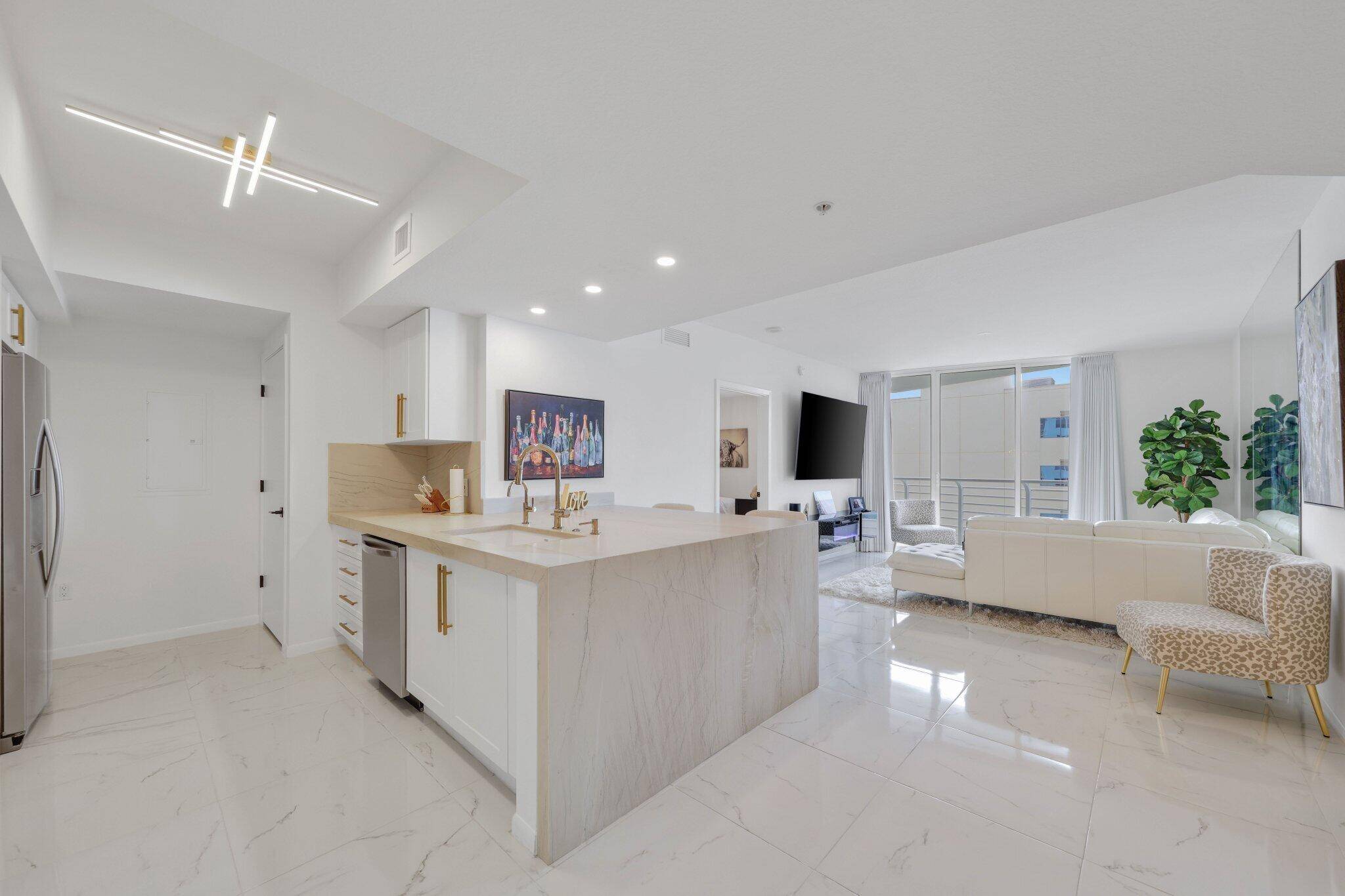 Experience luxury living in this beautifully updated 2 bed, 2 bath condo located in the heart of downtown West Palm Beach.