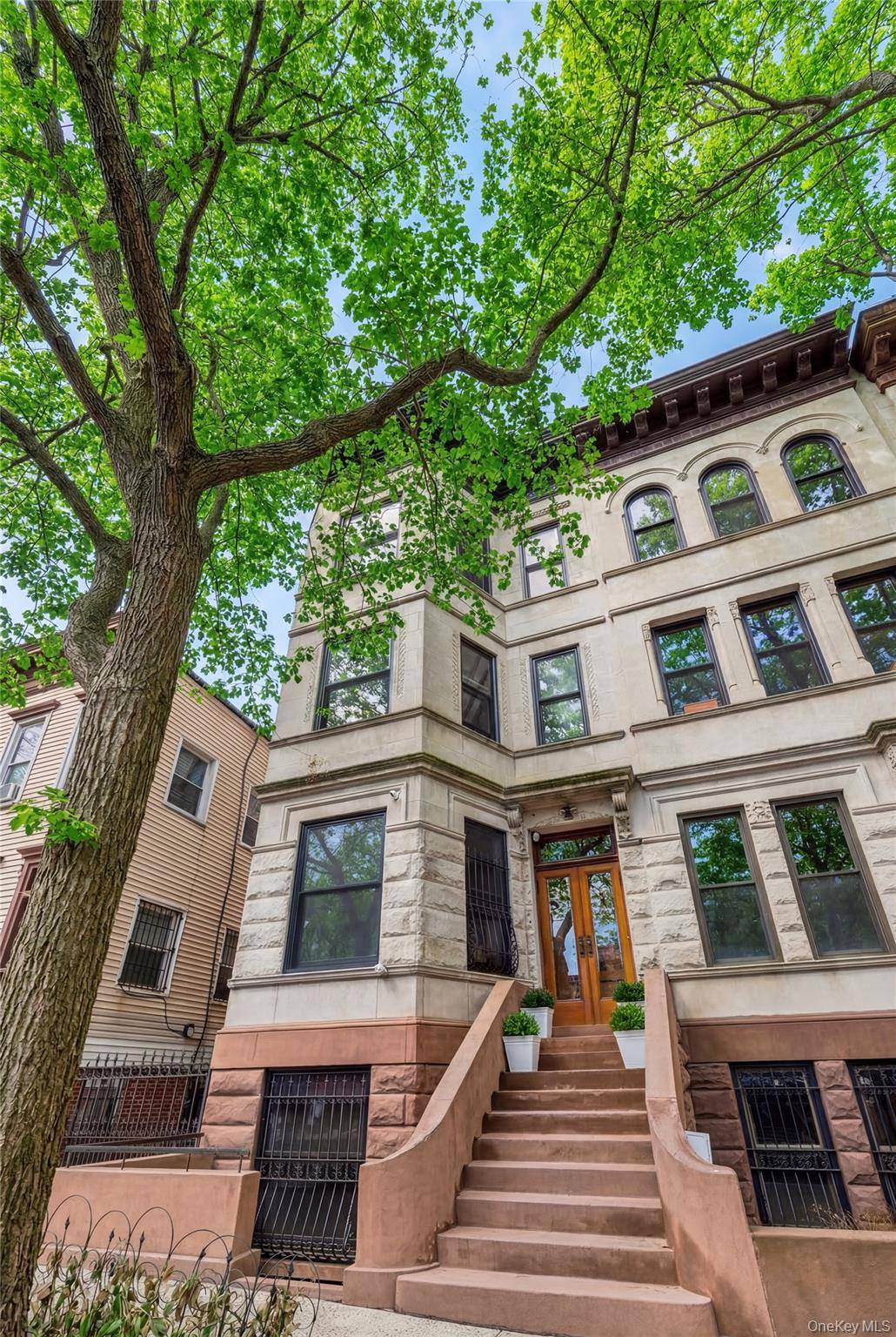 A landmark corner single family townhouse on iconic Jumel Terrace, a cobblestone block within the landmarked Jumel Terrace Historic District, directly facing the Morris Jumel Mansion and Roger Morris Park ...