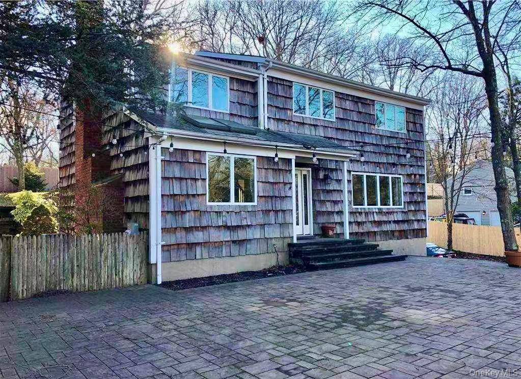Charming Colonial in Port Jefferson Village Located just minutes from golf, tennis, and a private residents only beach with free parking, this beautifully maintained 4 bedroom, 2.