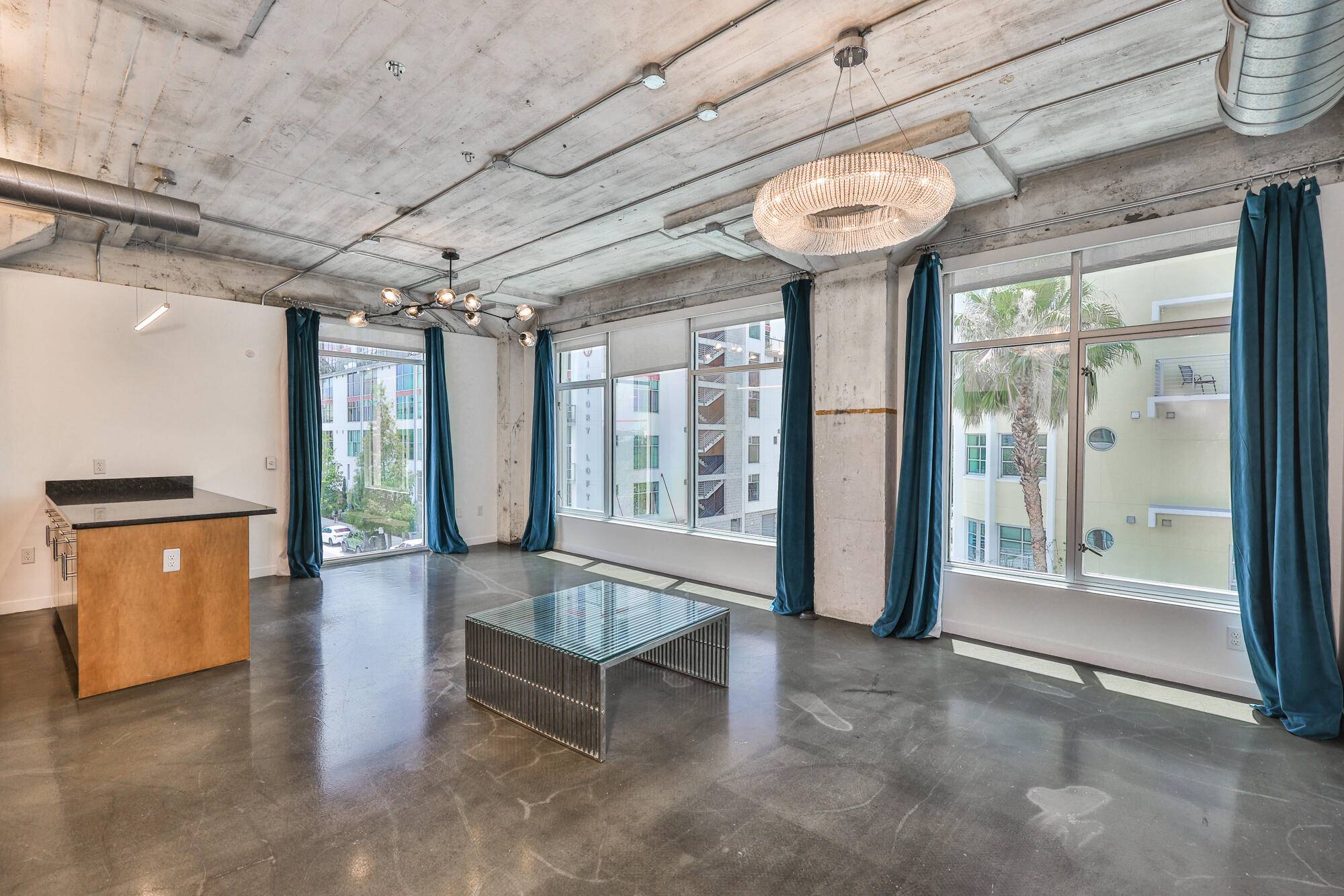 Industrial Style 1BR 1BA Corner Loft in Model T Channelside Live in the heart of Channelside in this stunning industrial style 1BR 1BA cornerloft at the iconic Model T building.