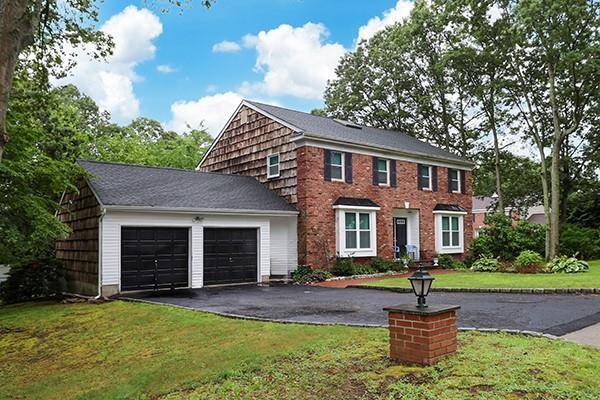 Welcome to this beautifully maintained Colonial style home featuring 4 spacious bedrooms and 2.