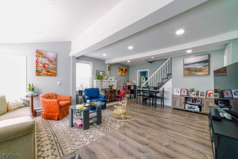 Move right into this beautifully updated and renovated 3 bedroom, 2 full bath home, ideally located just steps from Budd Lake the largest natural freshwater lake in New Jersey.