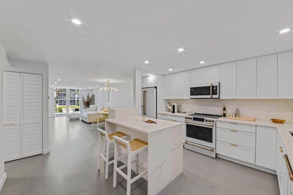 Experience the ultimate in modern coastal luxury with this stunning waterfront rental opportunity in desirable east Boca Raton.