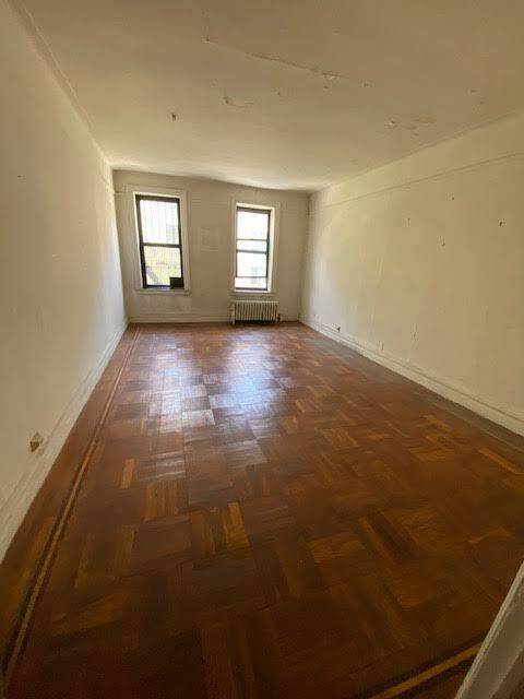 Unlock the potential of this front facing 2 bedroom, 1 bath apartment at 142 20 Franklin Avenue a true blank canvas ready for your creative touch.