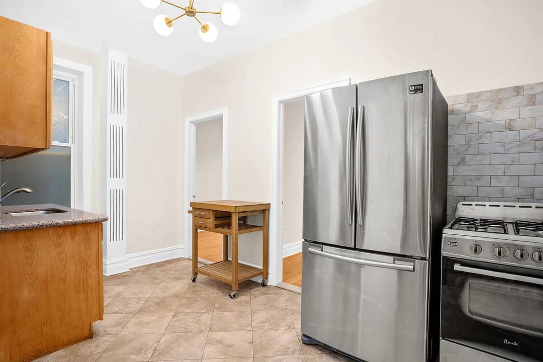 Originally built in 1910, this barrel front prewar four family is ideal for an end user in search of additional rental income or investors alike.