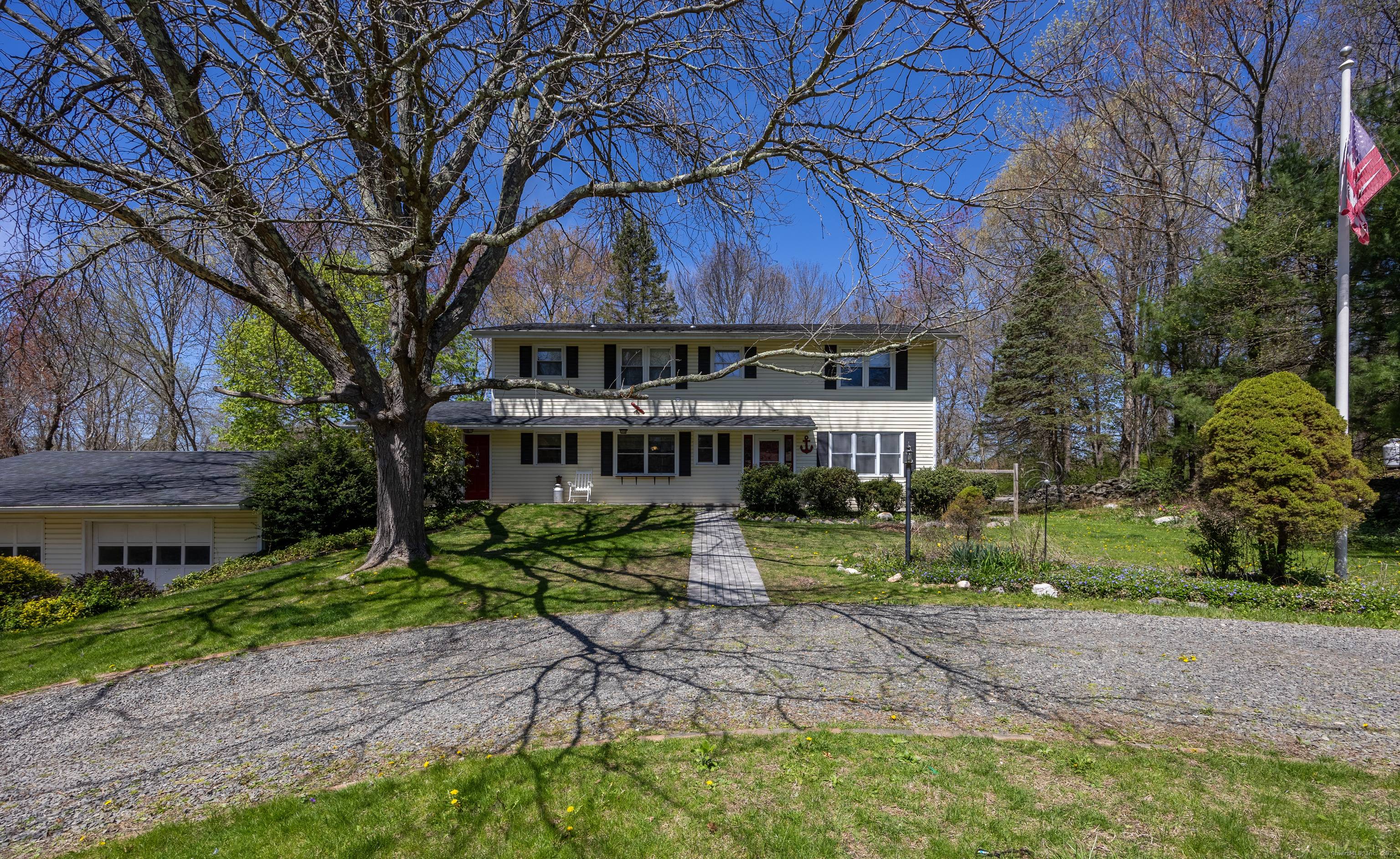 Nestled at the end of the road in a quiet cul de sac, this property sits on a peaceful 0.