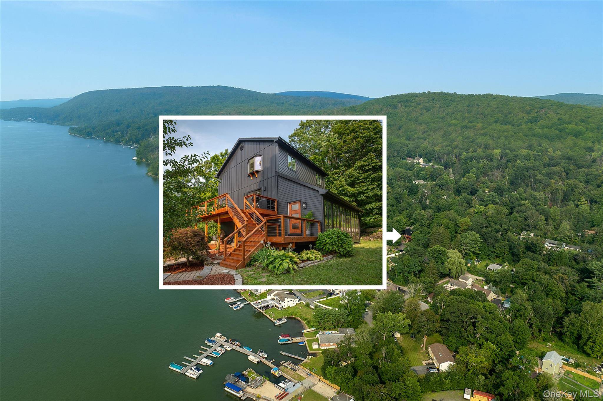 Overlooking the expanse of Greenwood Lake, this three level, 4 bedroom, 3.
