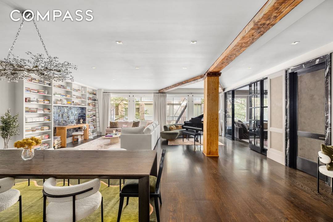 A Sophisticated SoHo Loft with Iconic Views This brilliantly reimagined loft at 14 Wooster Street pairs modern sophistication with the historic charm of SoHo s famed Cast Iron District.