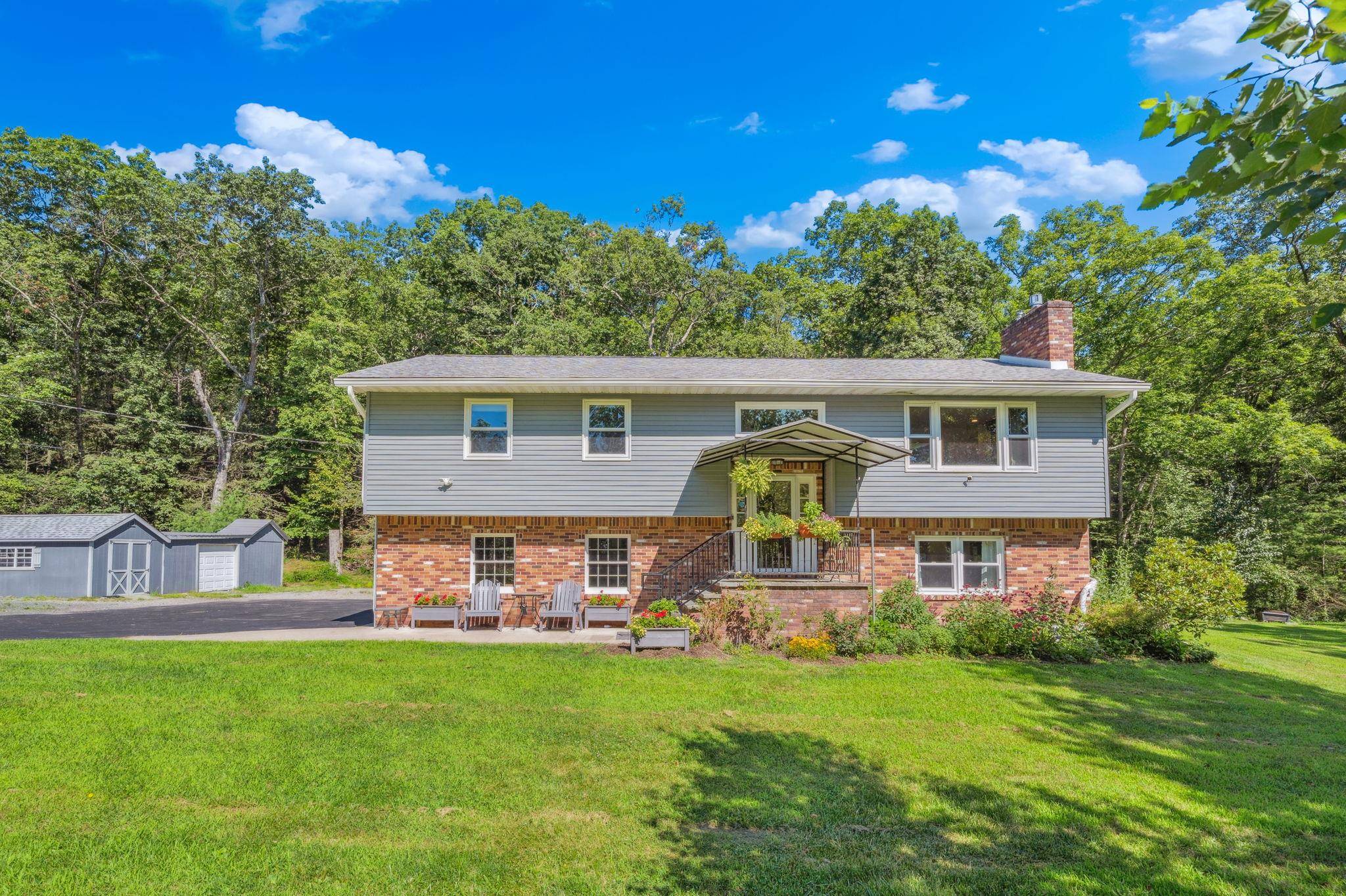 This lovely move in ready raised ranch is set on 1.
