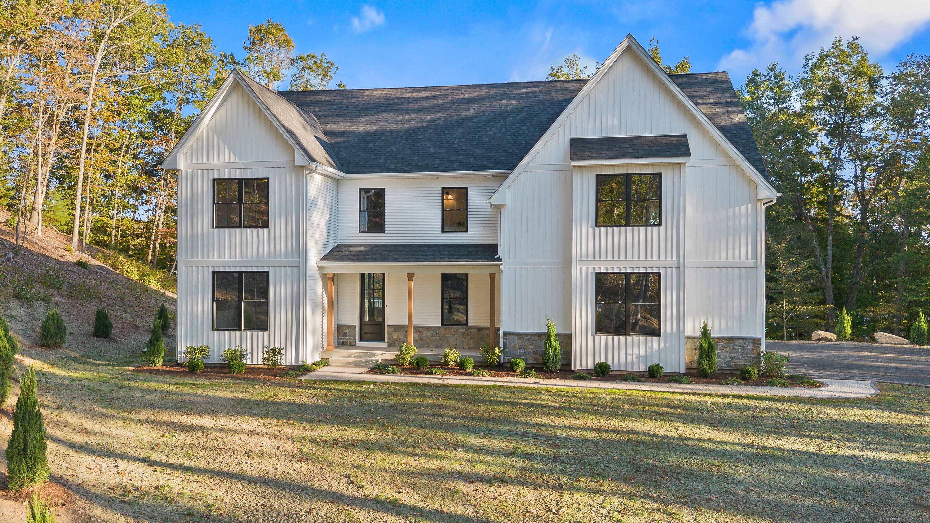 new construction with over 3300 square feet of living space country kitchen with large center island open to family room with gas fireplace slider to trex deck overlooking a Willow ...