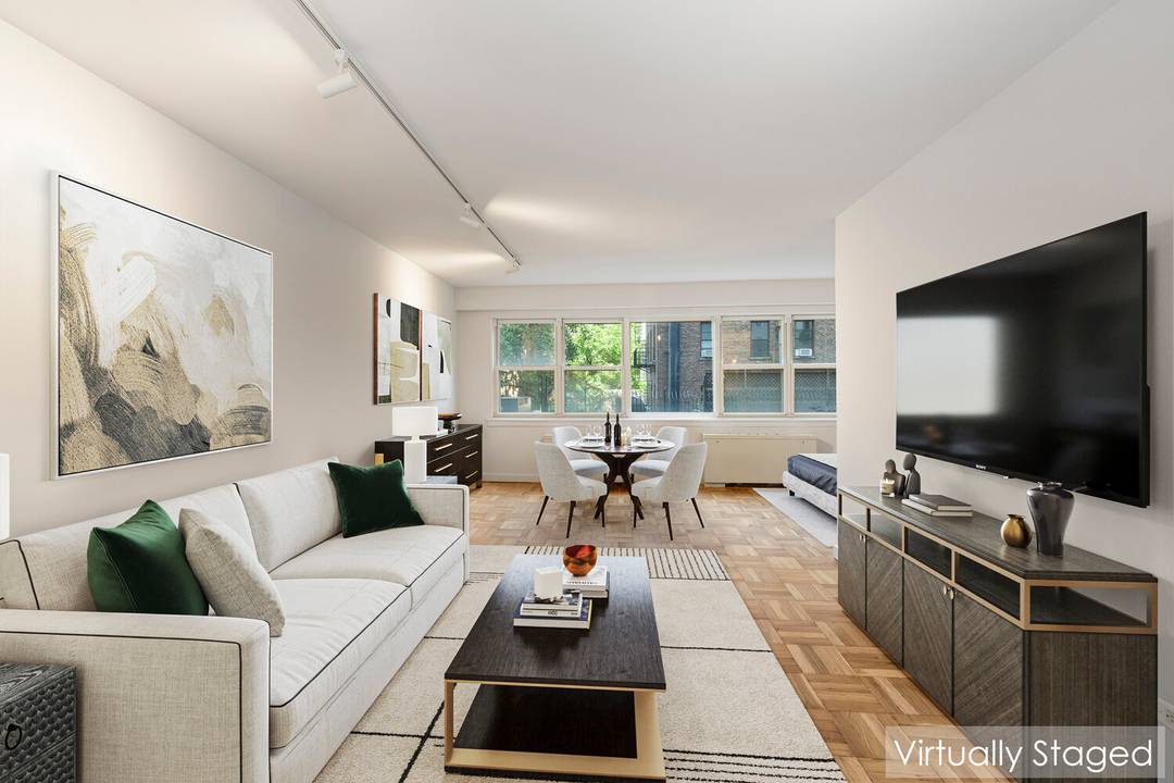 Welcome to this thoughtfully renovated alcove studio in the highly sought after John Adams a premier full service co op located in the heart of Greenwich Village.