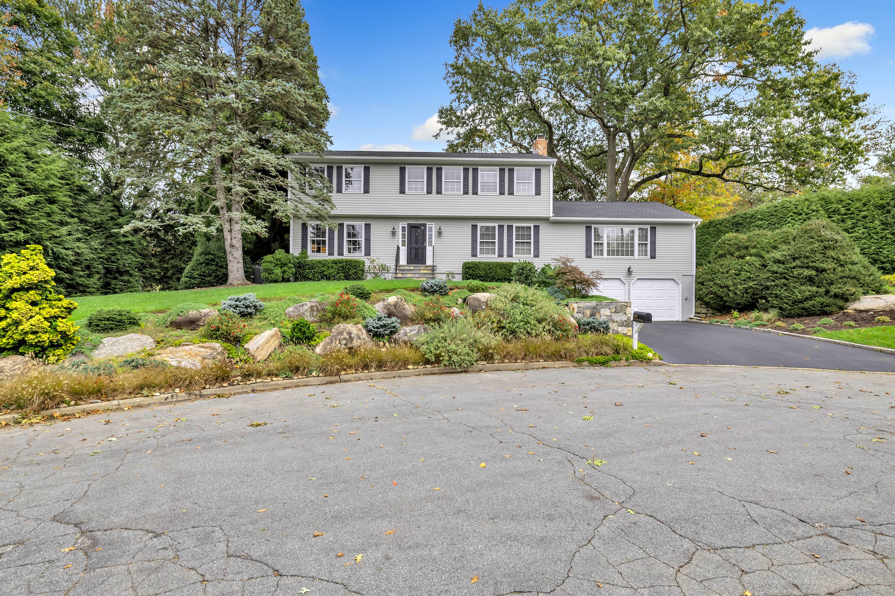 Tucked away at the end of a tranquil cul de sac in one of Fairfield's most desirable neighborhoods, this center hall Colonial exudes timeless elegance with mature landscaping and wonderful ...