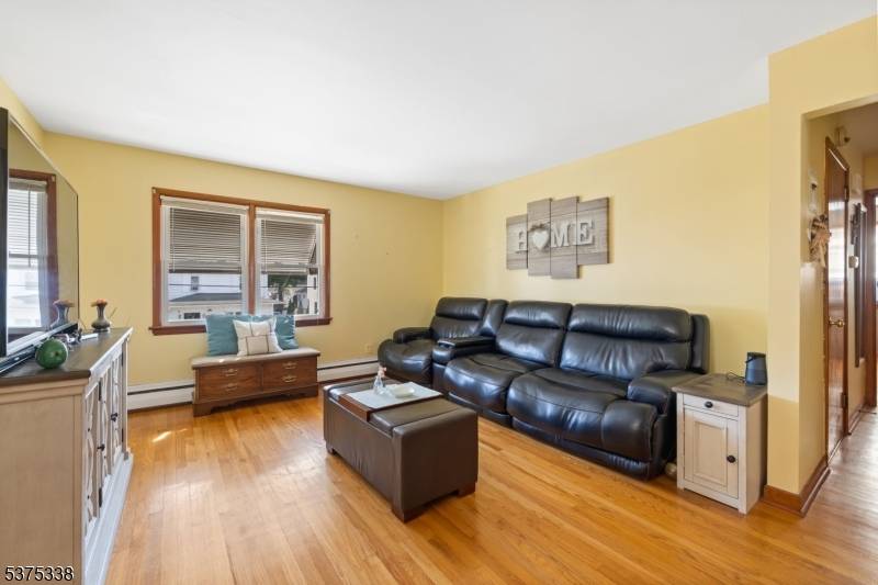 Excellent opportunity to own a well maintained 2 family home in the heart of Totowa !