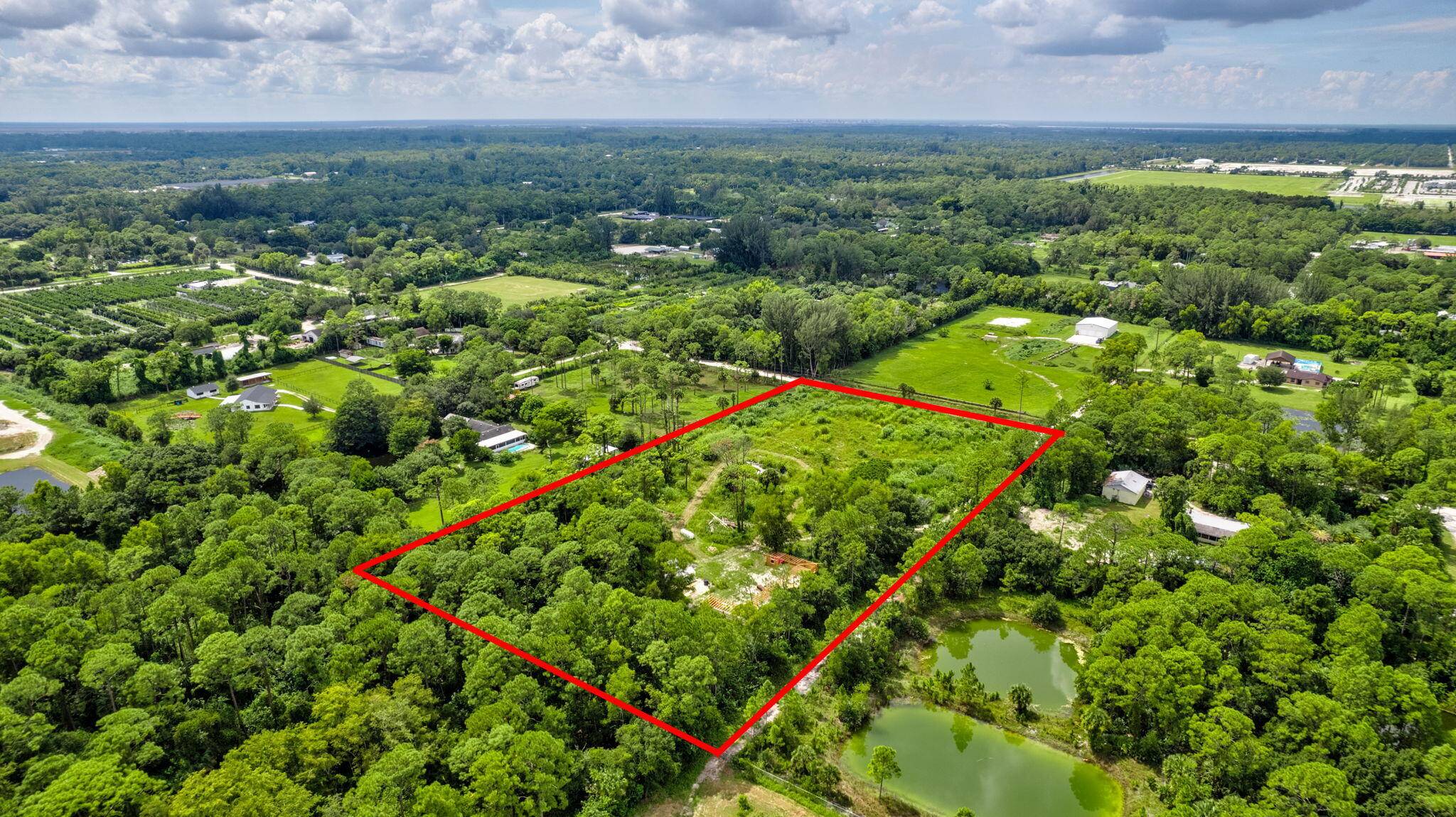 Discover this 5 acre paradise, perfect for your agricultural residential dreams !