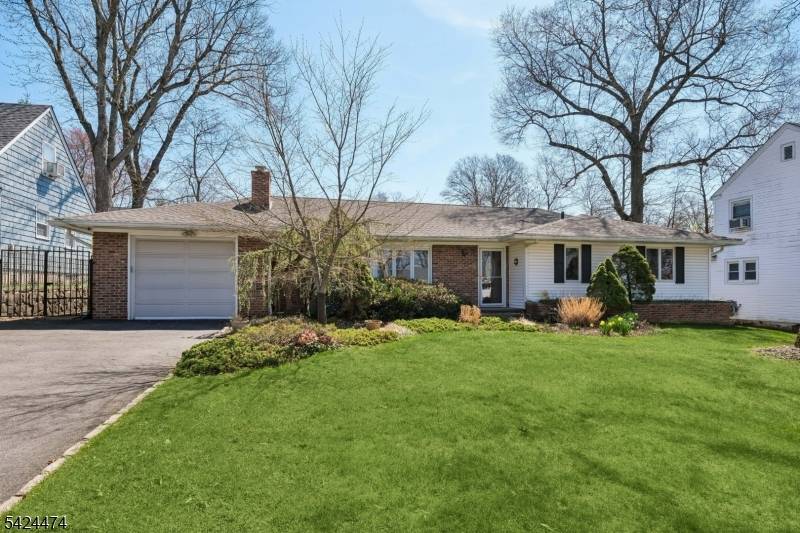 Tucked at the end of a quiet dead end street in the highly coveted St.