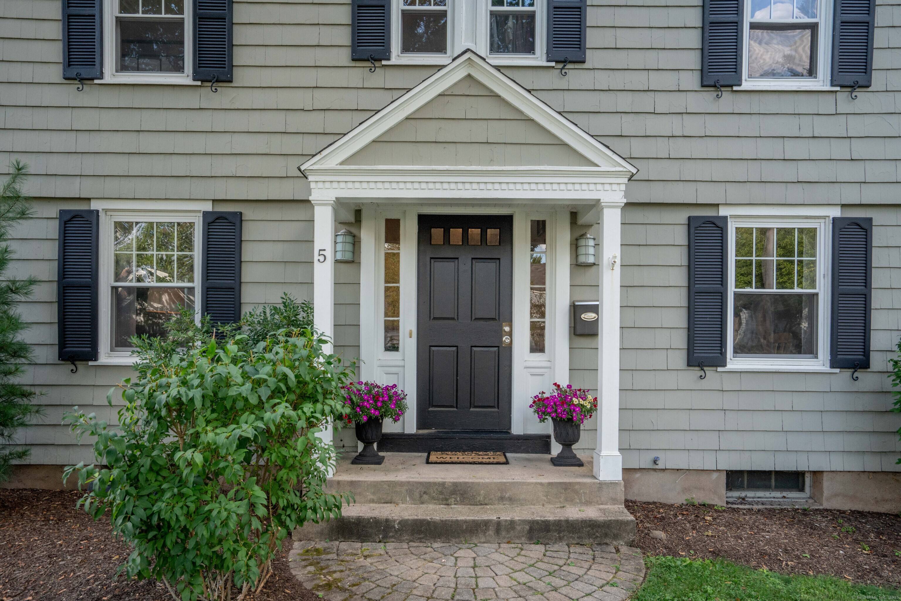 Welcome to this inviting 4 bedroom, 1.