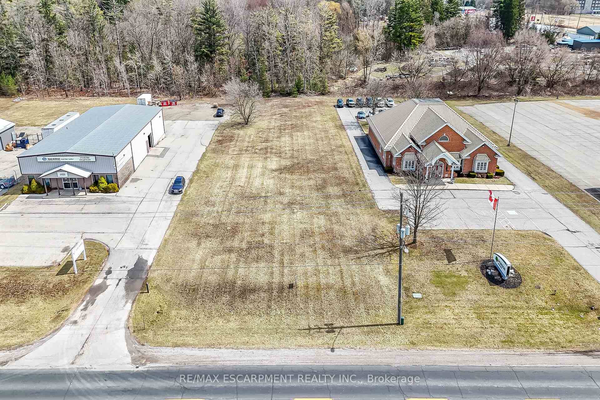 Ideally located, rarely offered 100' x 350' serviced lot located in Simcoe's most prestigious Business park on sought after Park Road.